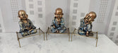 Polyresin Baby Monk Idol On Cot Table Decor 9*13
