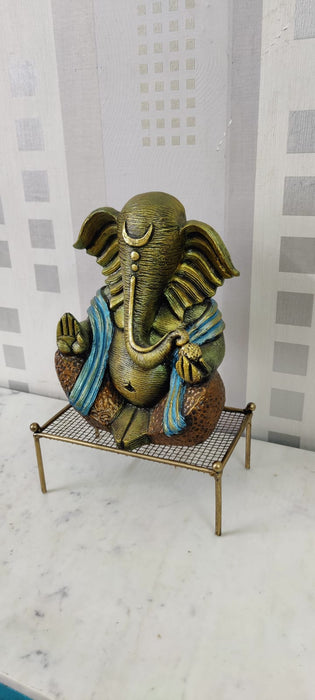 Polyresin  Ganesha Idol On Cot 9*14