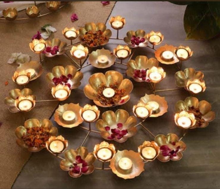 Big metal lotus diya rangoli